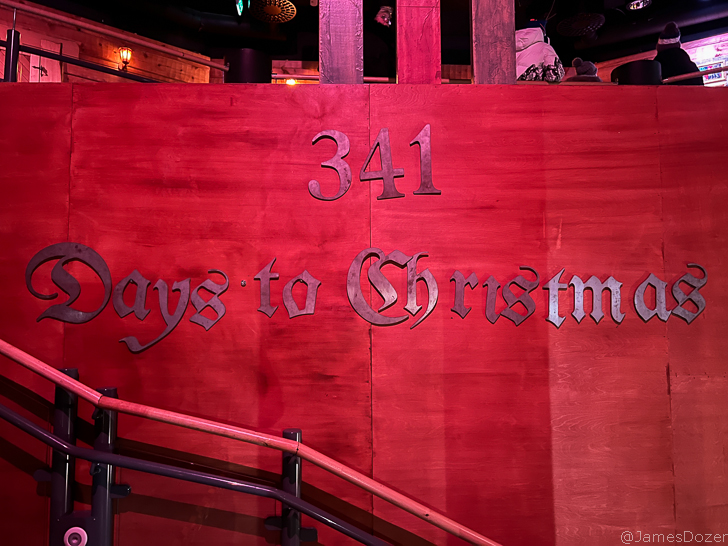 a red sign with writing on it