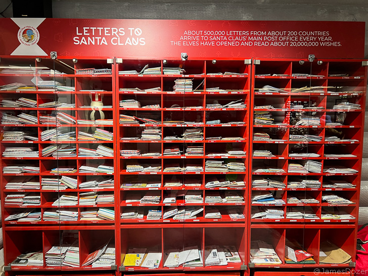 a red shelves with a group of books
