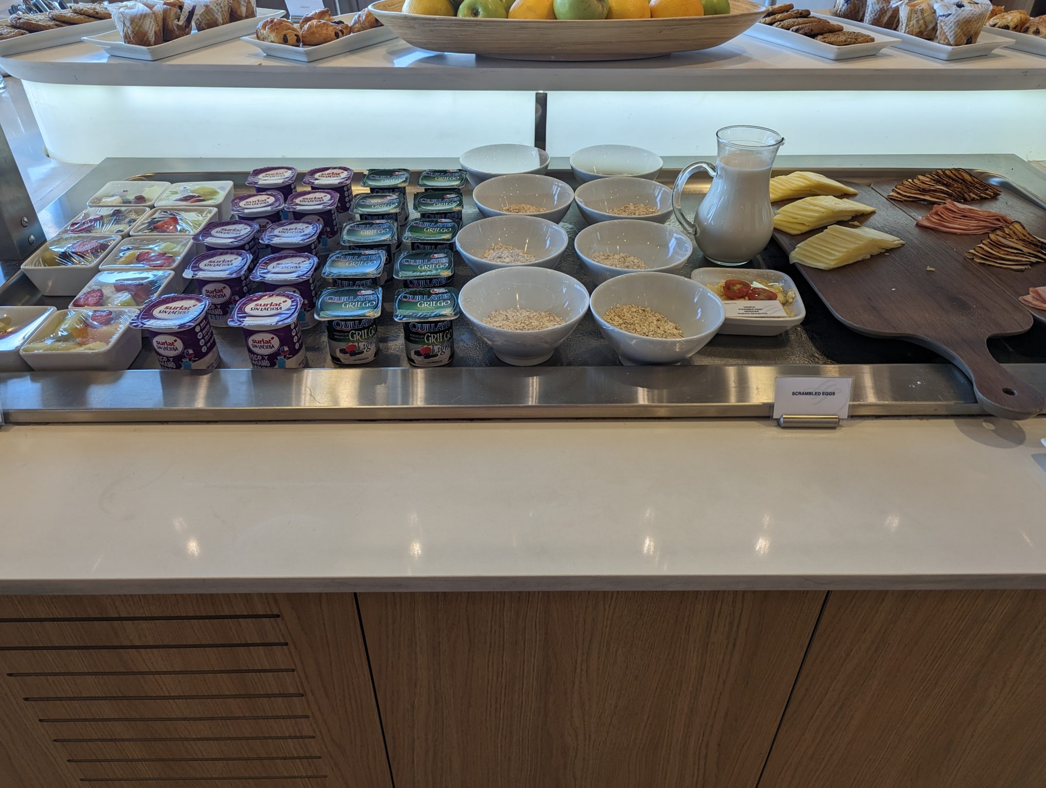 a buffet with different food items on it