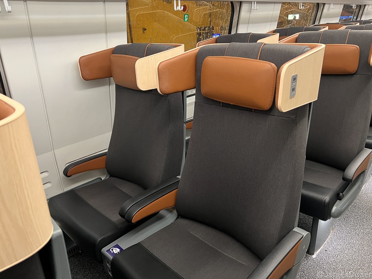 a row of chairs in a train