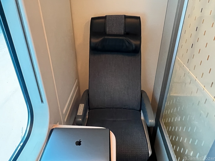 a chair in a corner of a room