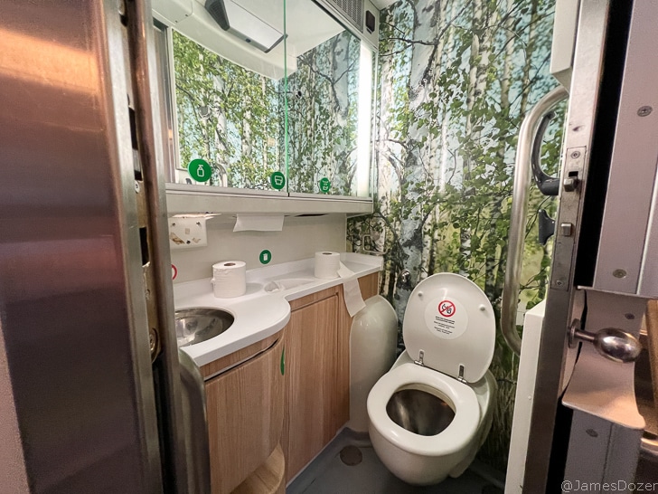 a bathroom with a toilet and sink