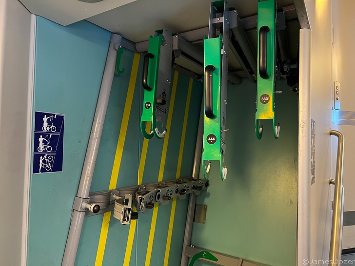 a green and grey bicycle racks