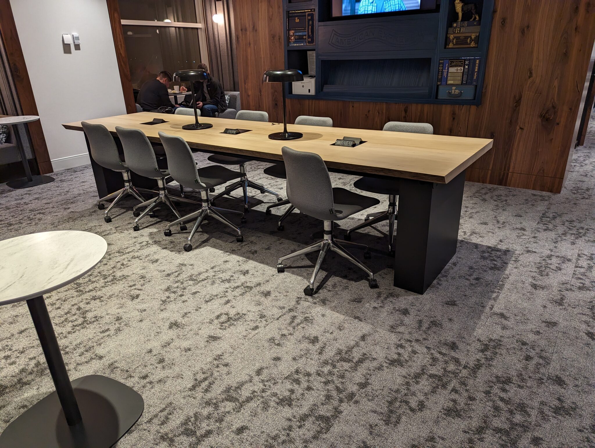 a room with a table and chairs