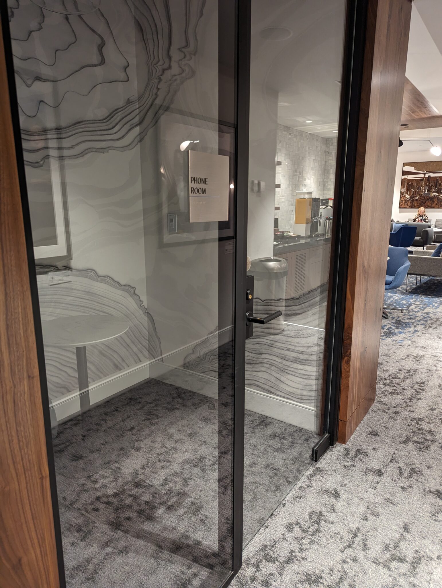 a glass door with a glass door in a room