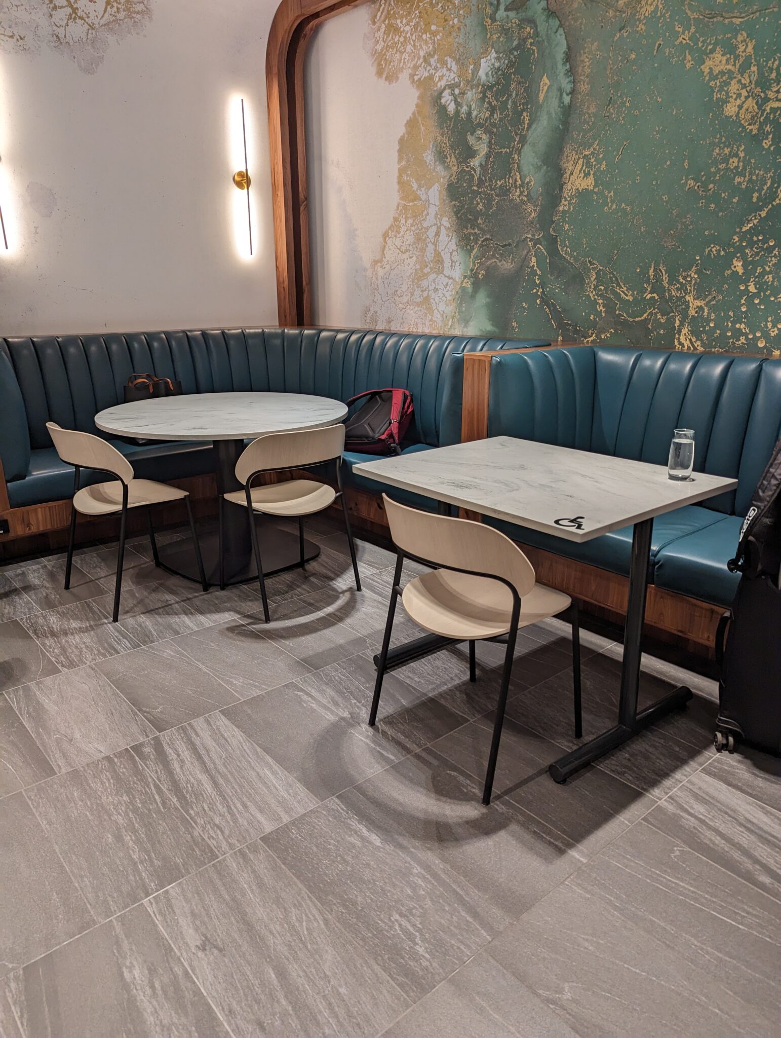 a table and chairs in a booth