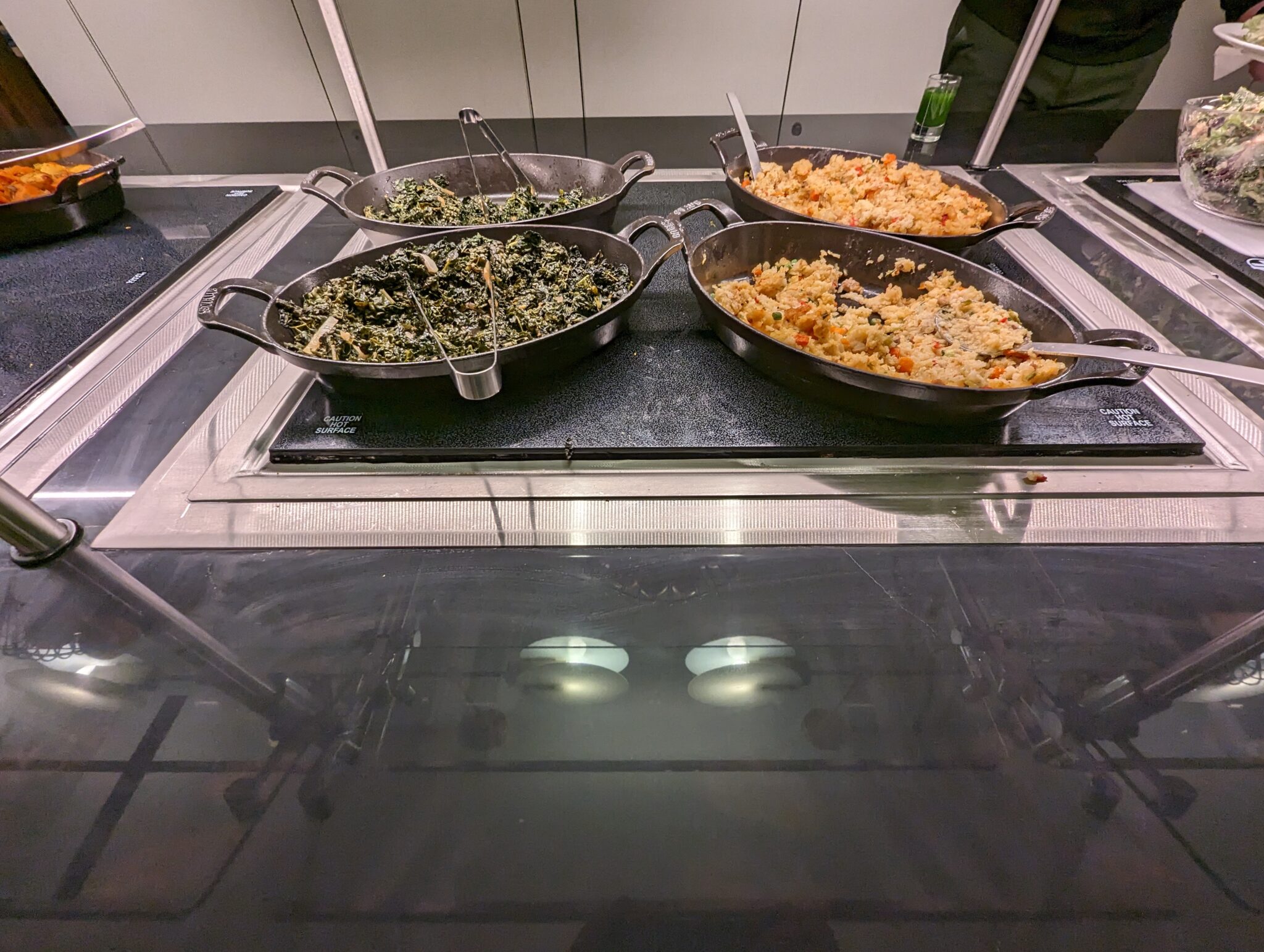 a group of pans of food on a counter