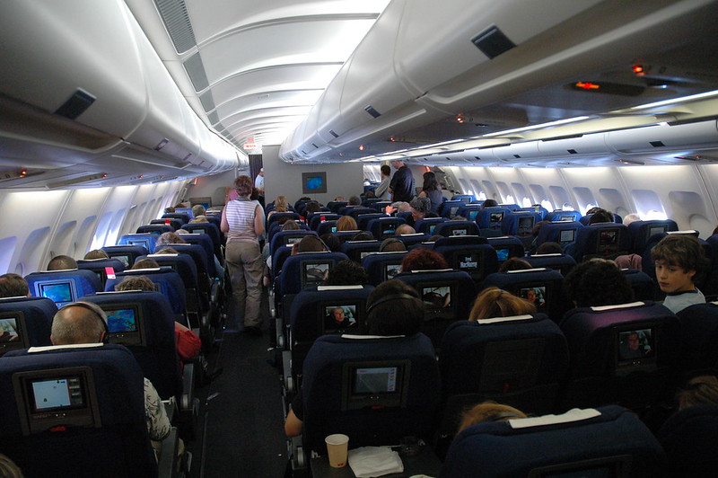 a group of people in an airplane