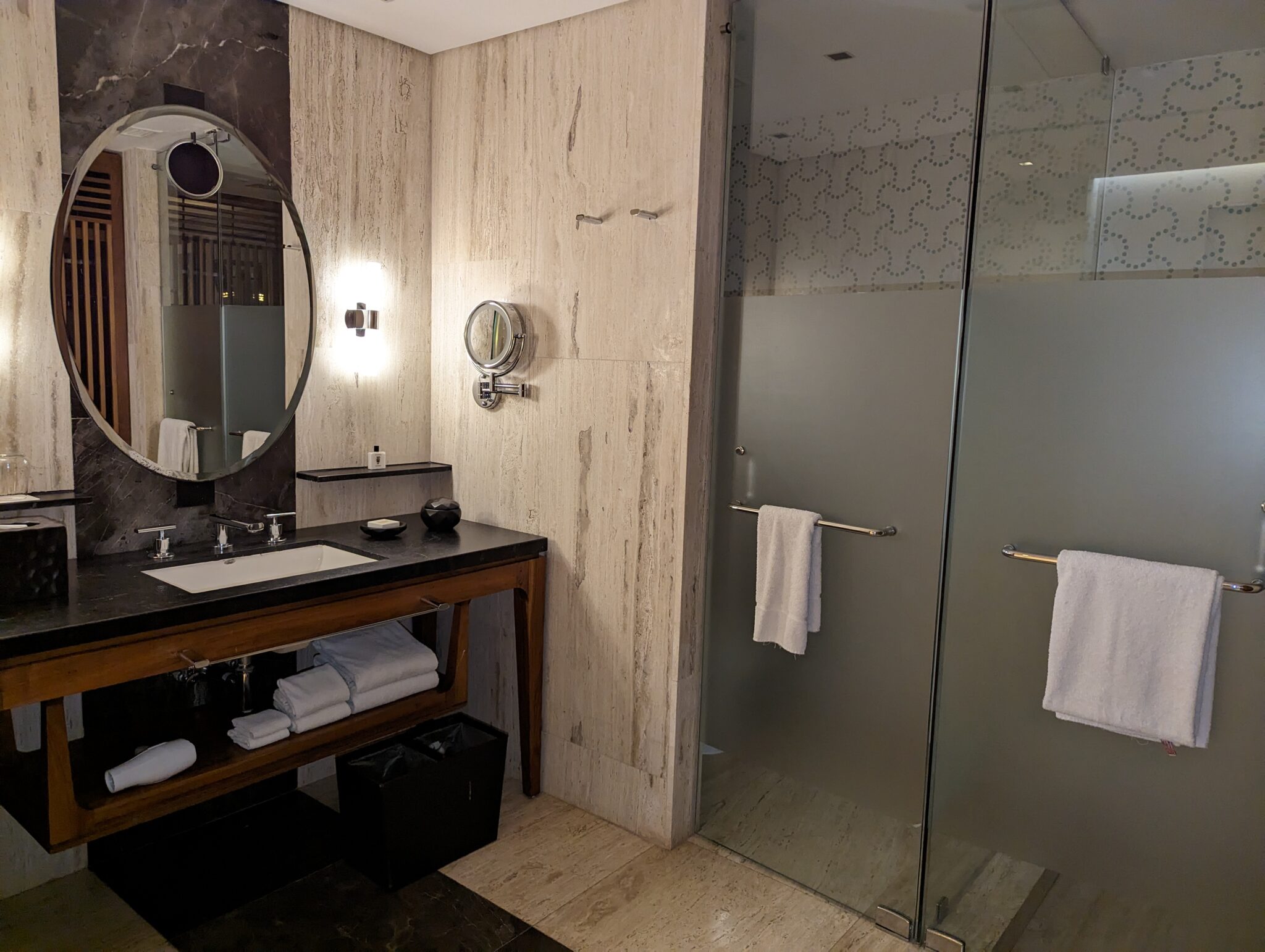 a bathroom with a mirror and a sink