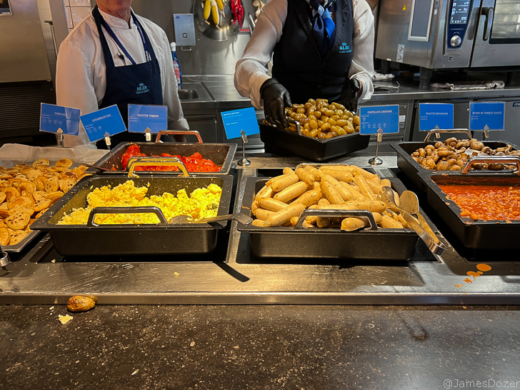 a group of people in a kitchen