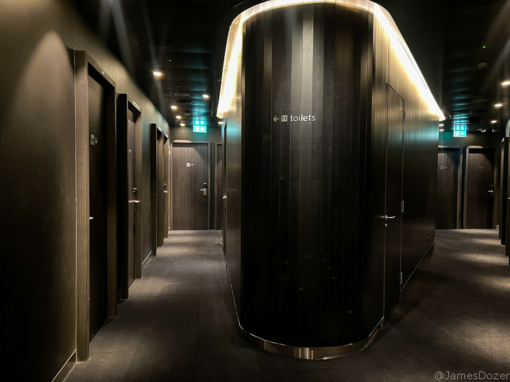 a row of wooden toilets