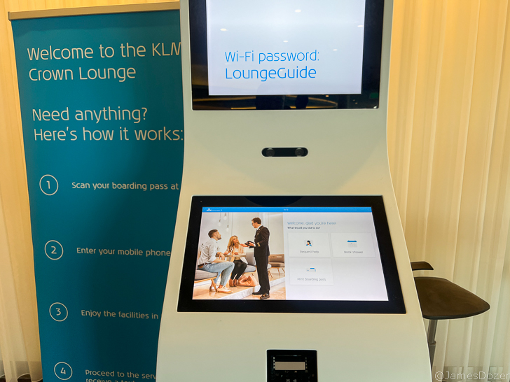 a kiosk with a screen and a screen