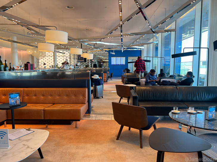 a group of people sitting in a lounge area
