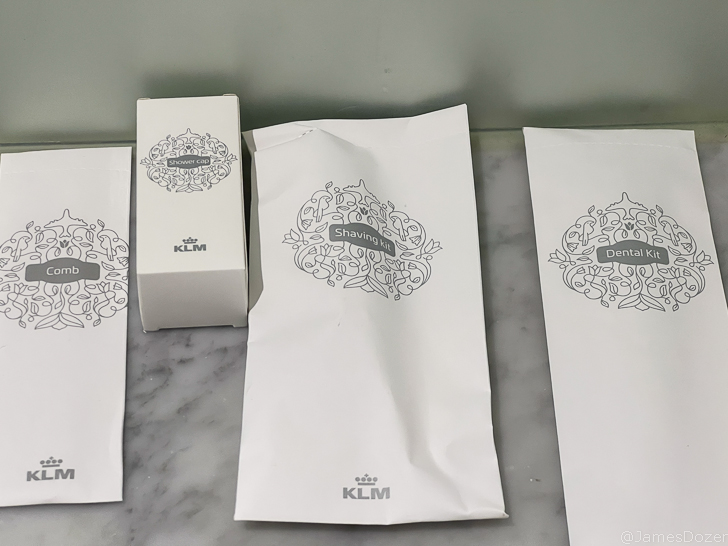 a group of white bags with designs on them