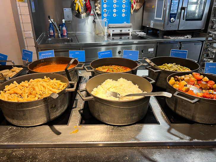 a group of pots of food