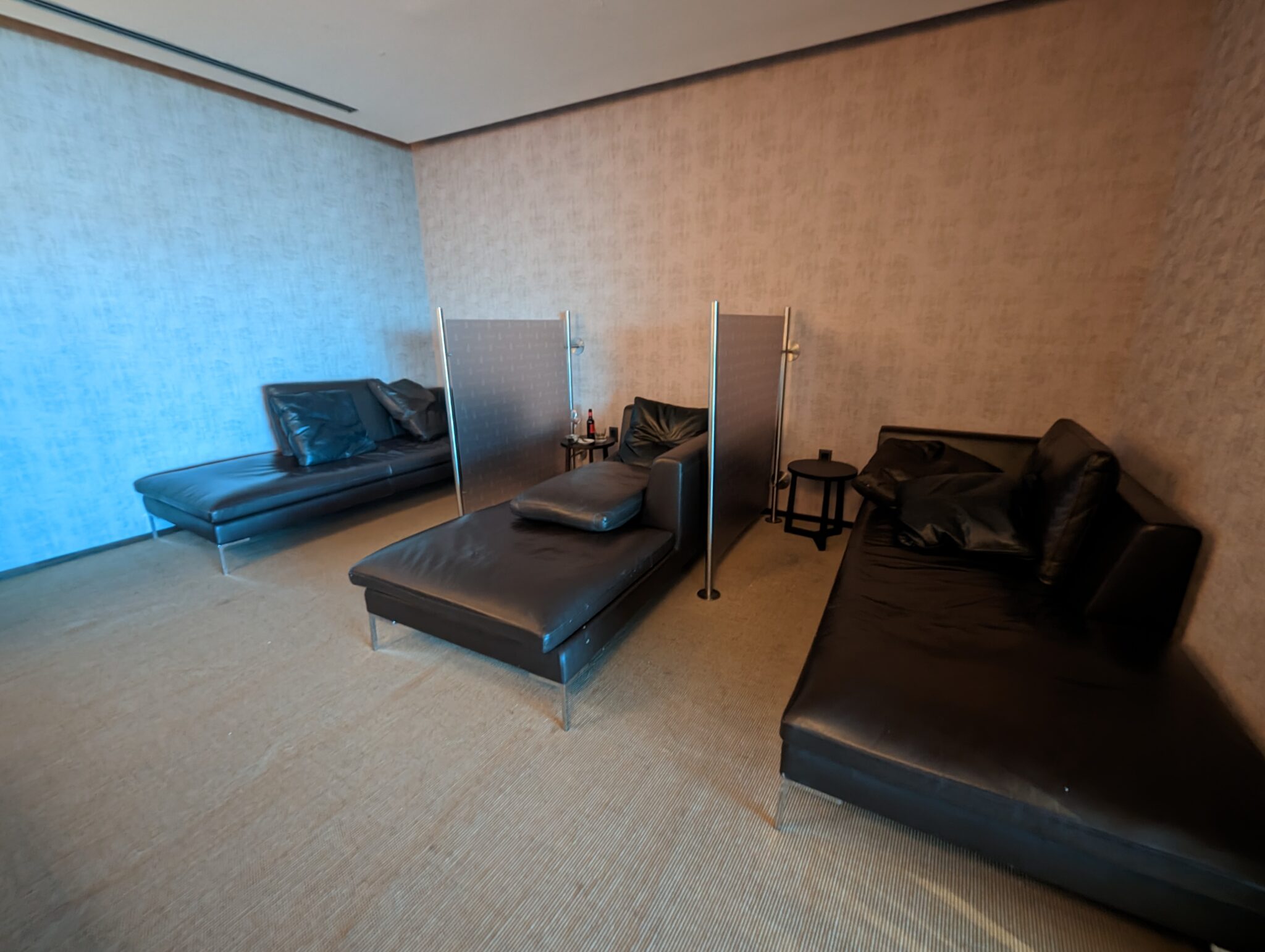 a room with couches and chairs