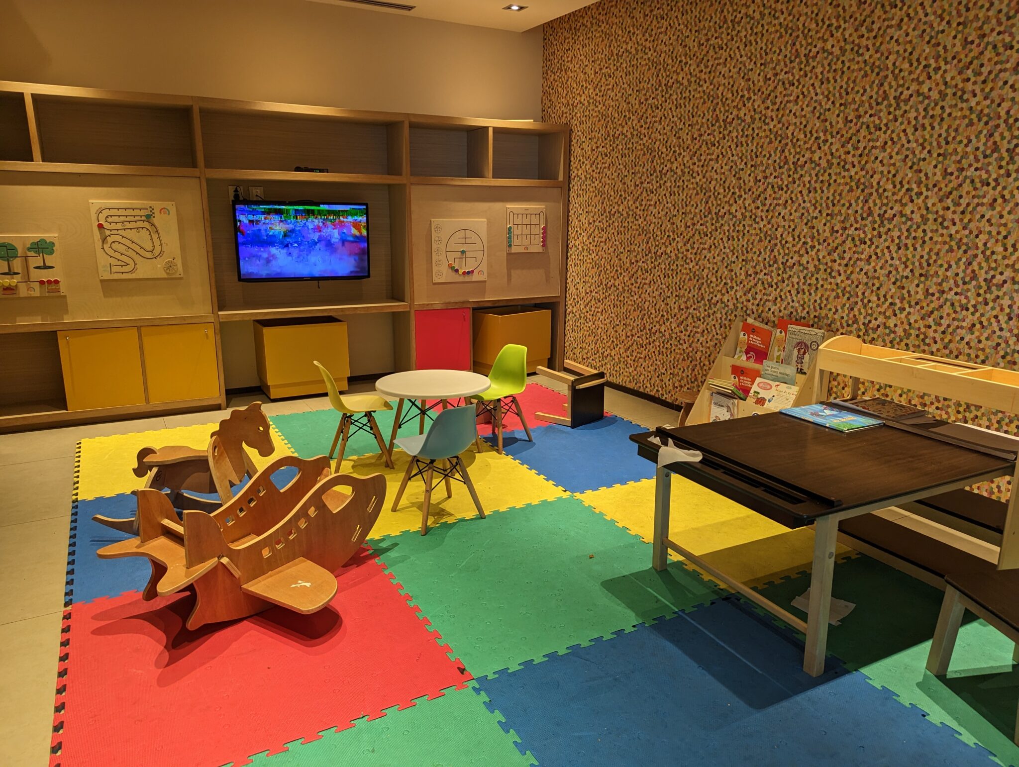 a room with a table and chairs