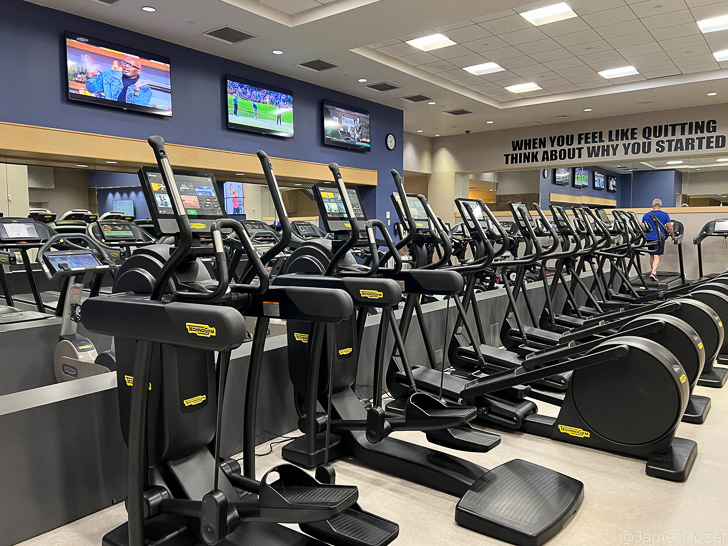 a group of treadmills in a gym