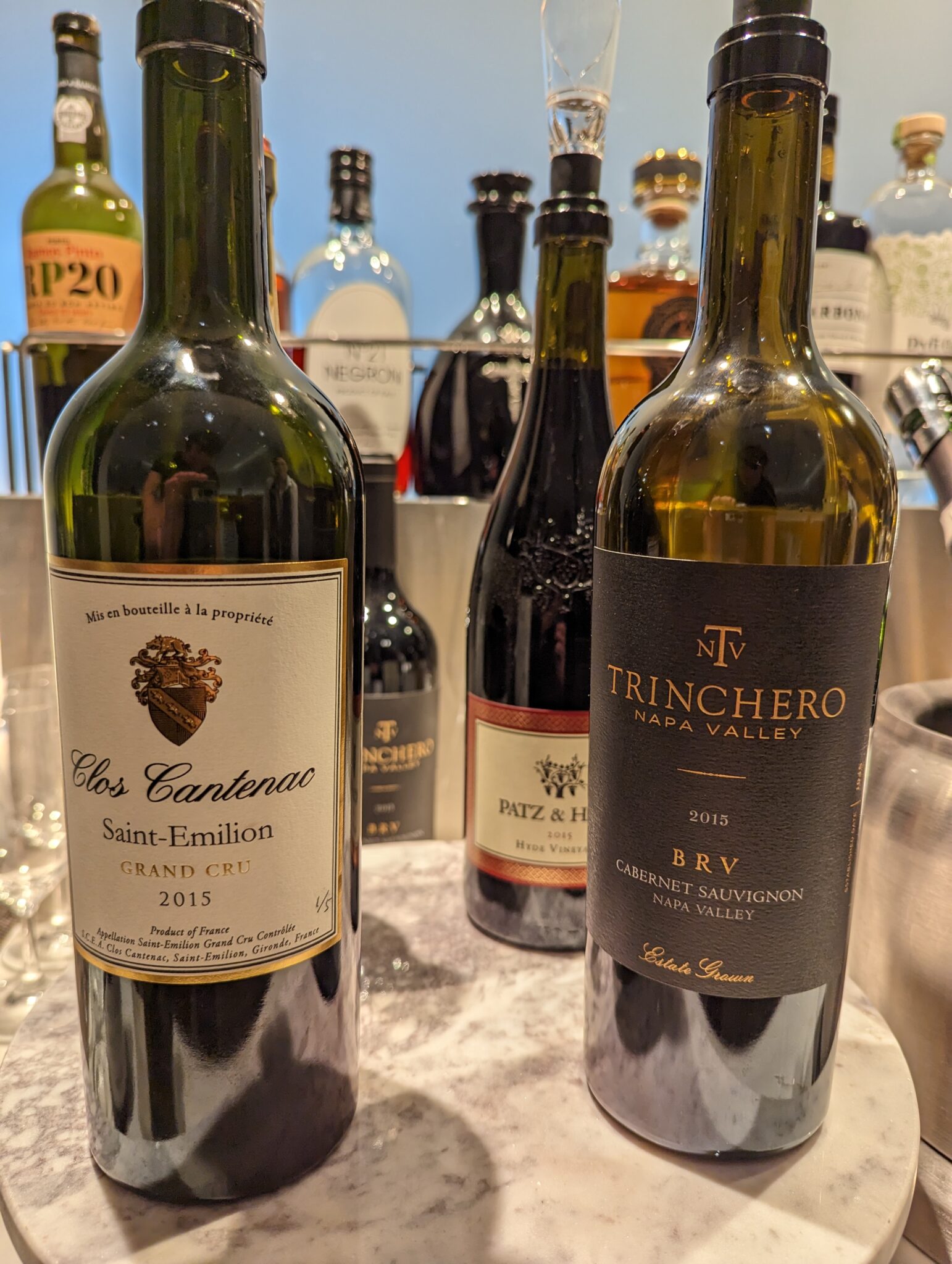 a group of wine bottles on a table