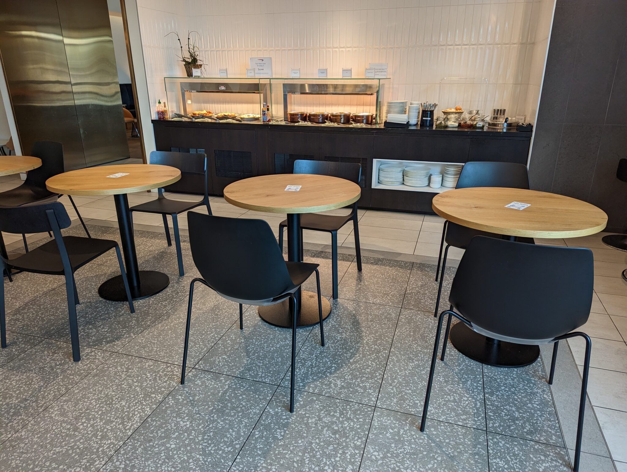 a room with tables and chairs
