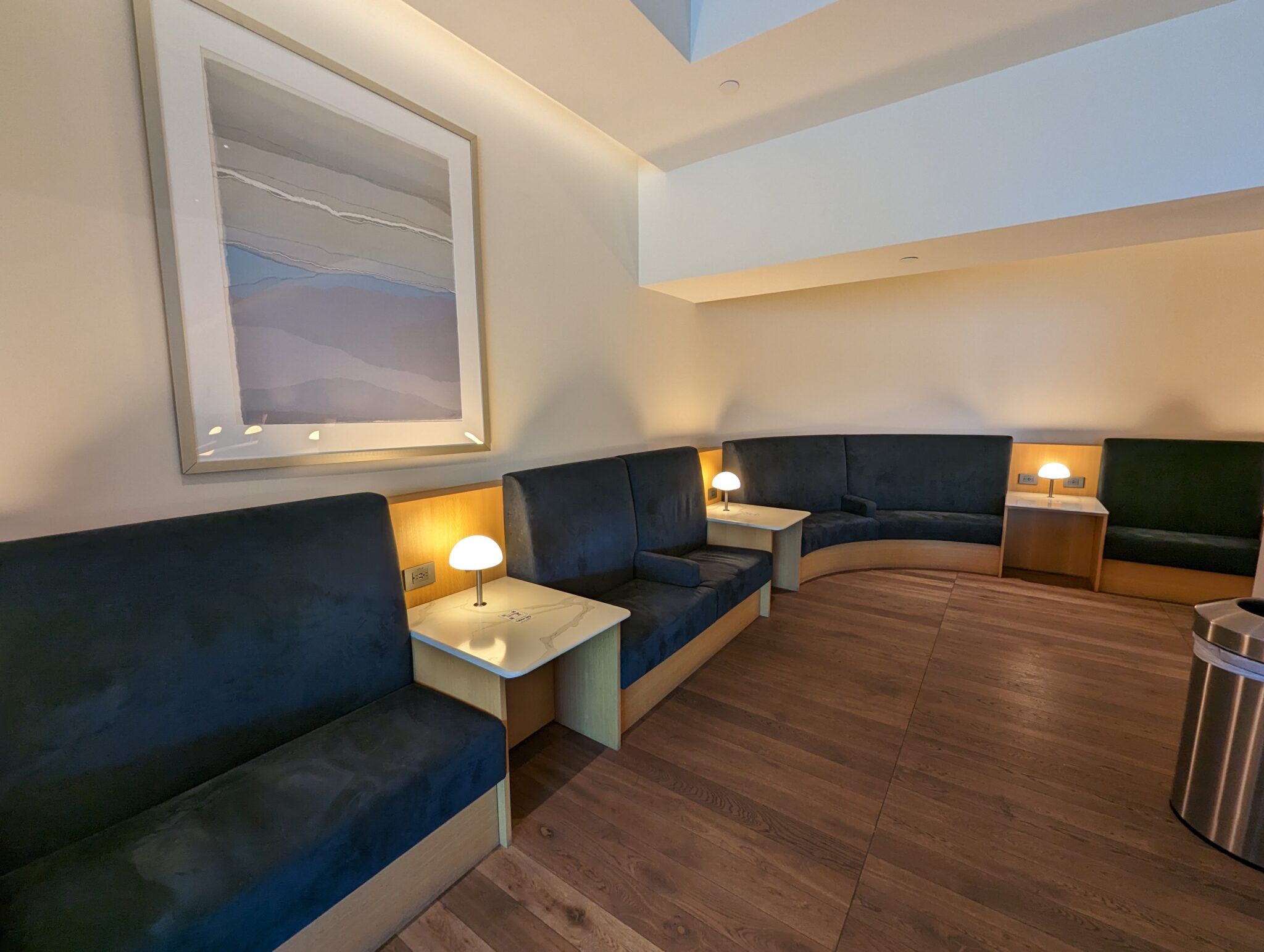 a room with couches and tables