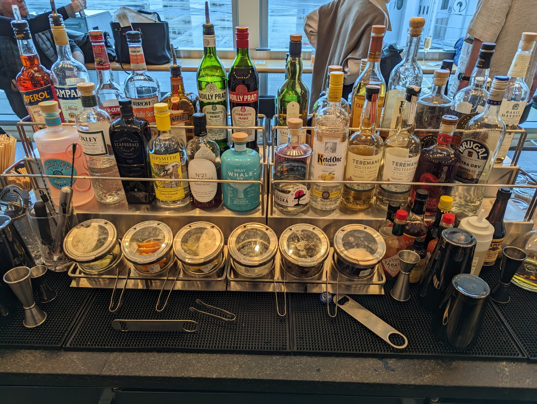 a bar with bottles of alcohol