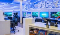 a room with computers and gaming equipment