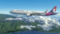 a plane flying over a land