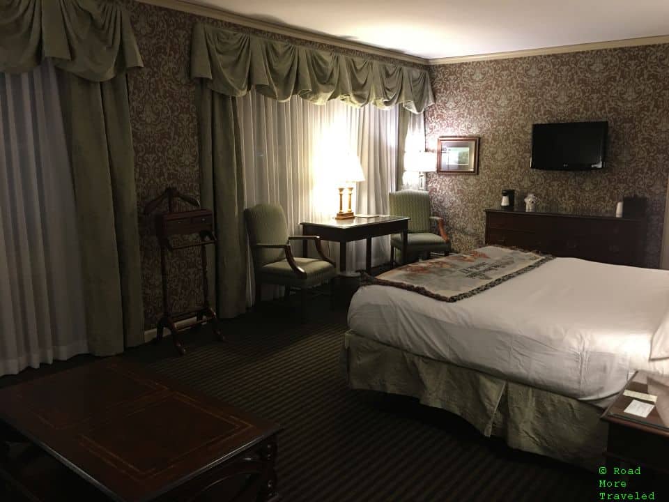 Brown Hotel luxury suite bedroom and TV