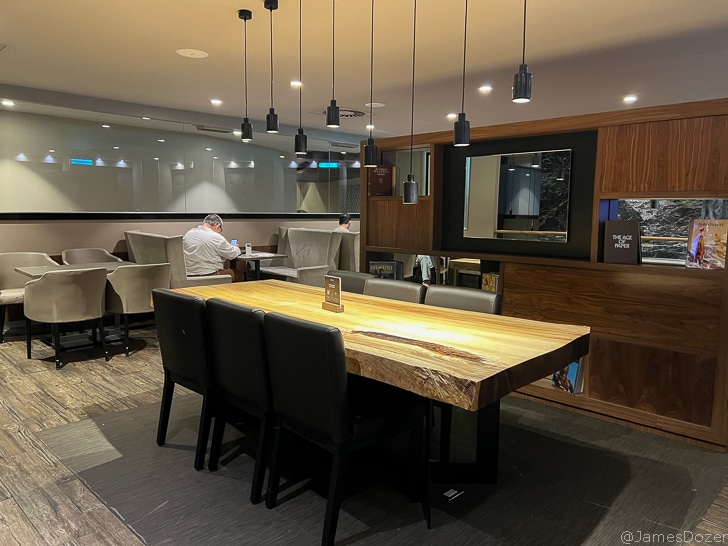 a room with a table and chairs