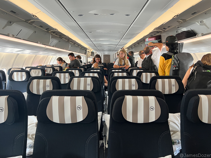a group of people sitting in a plane