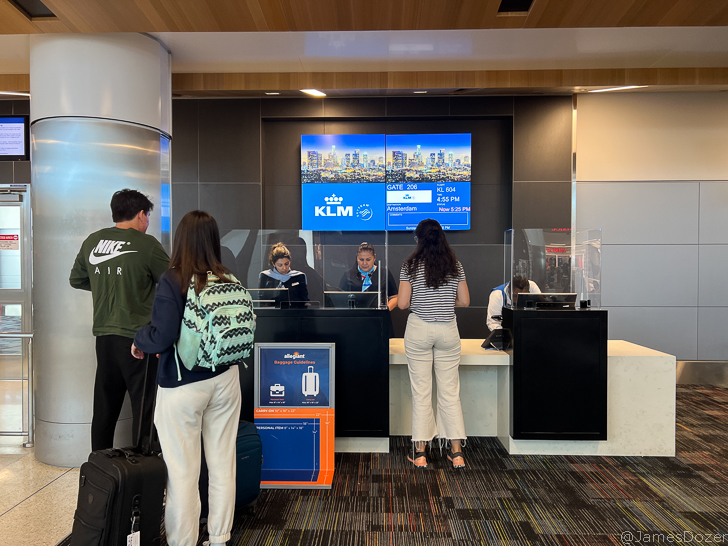 people standing in front of a counter