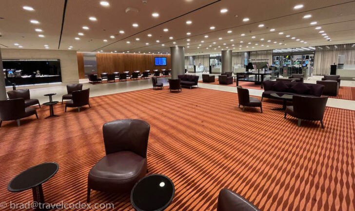 a room with chairs and tables
