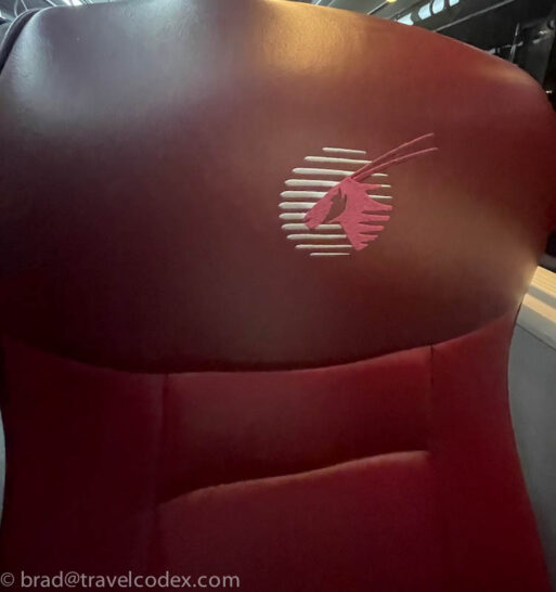 a red chair with a logo on it