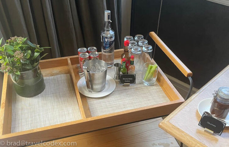 a tray with drinks and bottles on it