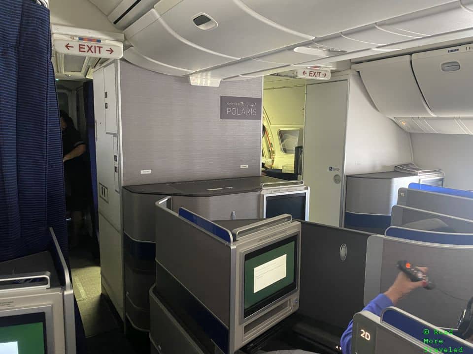 United 767-400 Polaris Business Class - cabin sign