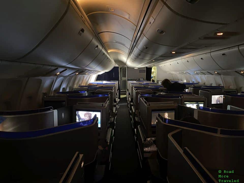 United 767-400 Polaris Business Class - cabin with lights off