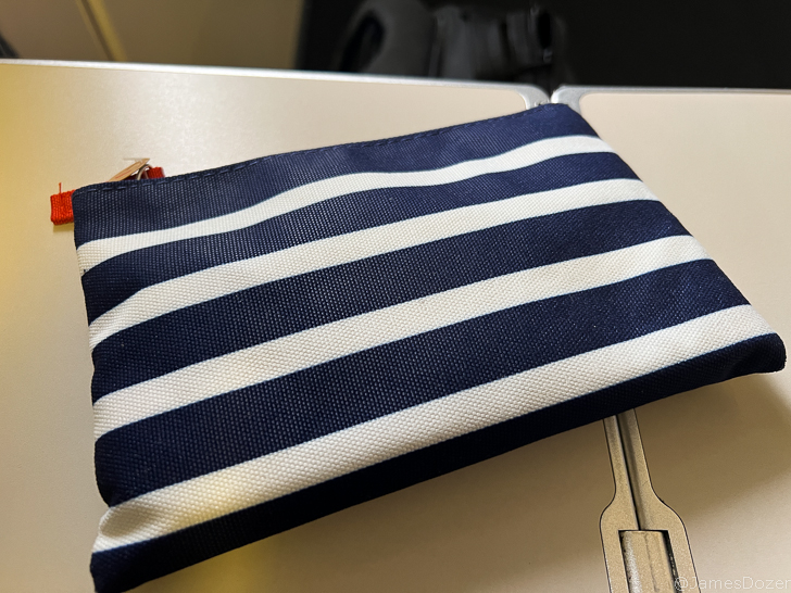 a blue and white striped bag