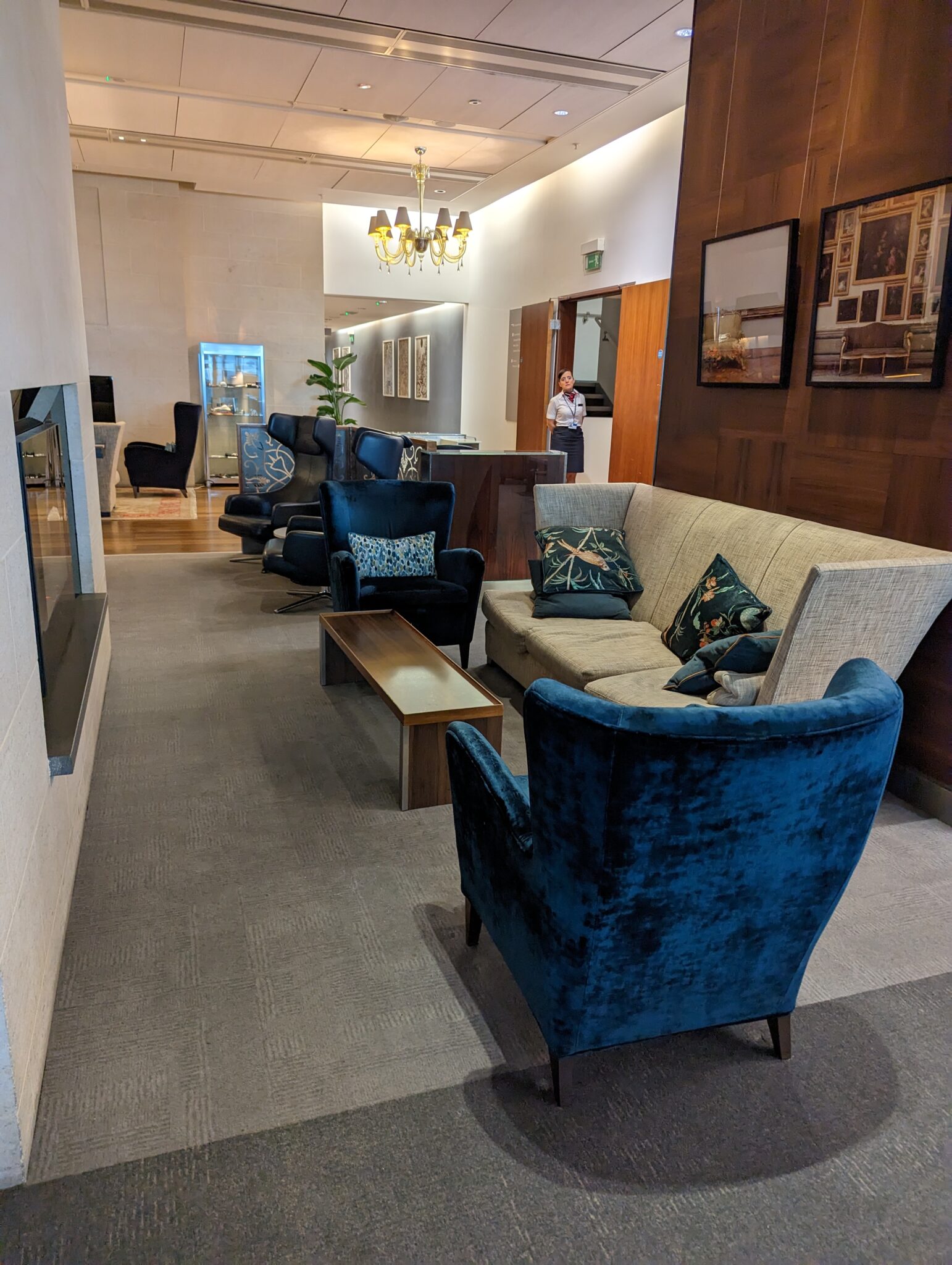 a room with couches and chairs