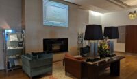 a room with a fireplace and a couch