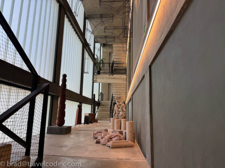 a staircase with a few rolls of toilet paper on the floor