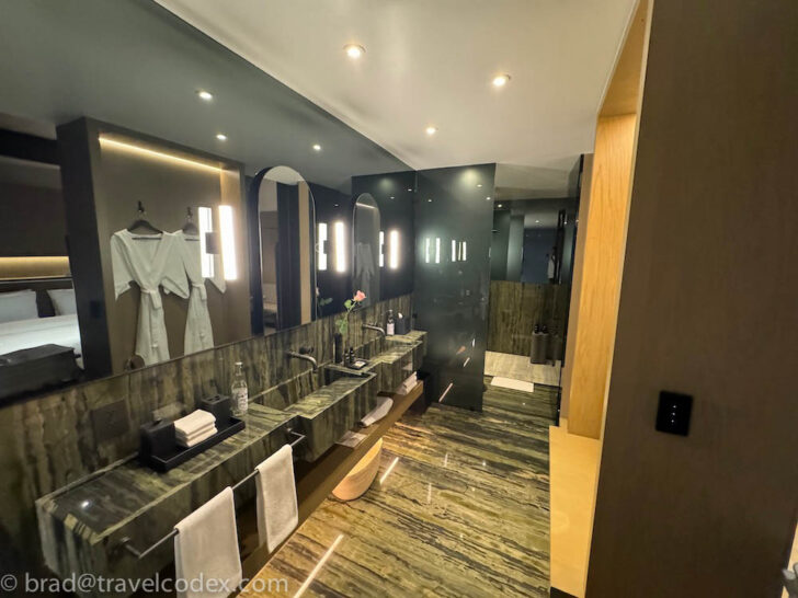 a bathroom with a mirror and sinks