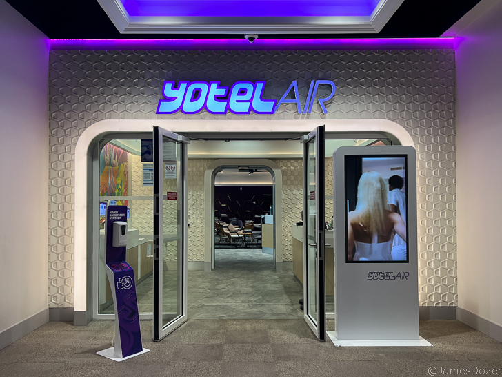 a building with a sign and a screen