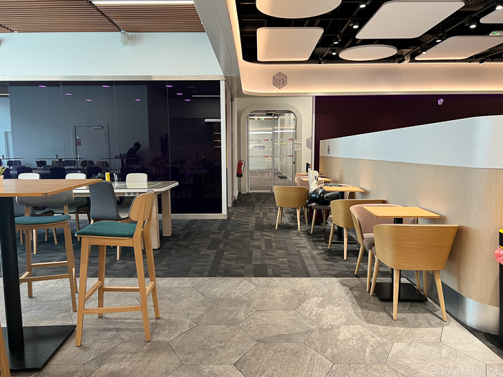a room with tables and chairs