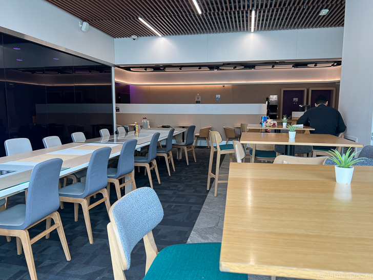 a room with tables and chairs