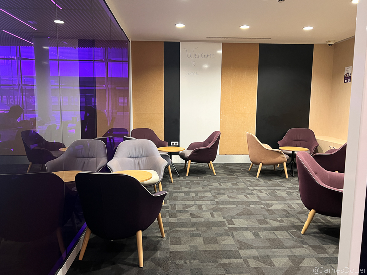 a room with chairs and tables