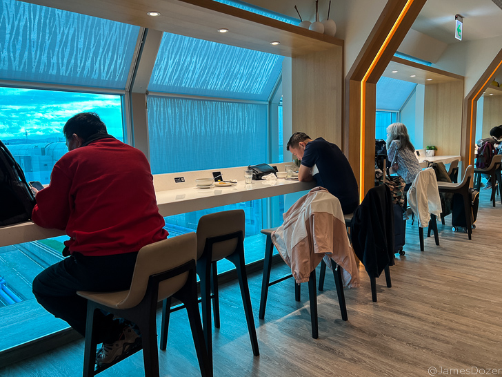 people sitting at a bar