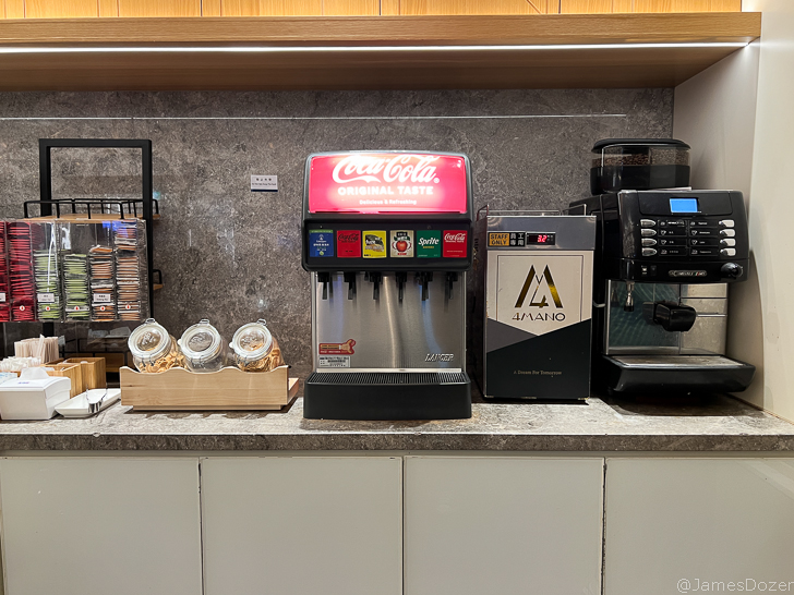 a coffee machine and coffee maker on a counter