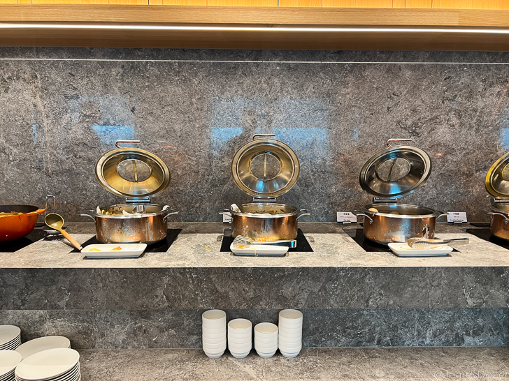 a group of pots on a counter