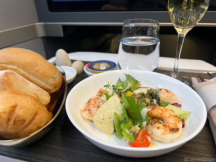 a plate of food and a glass of water